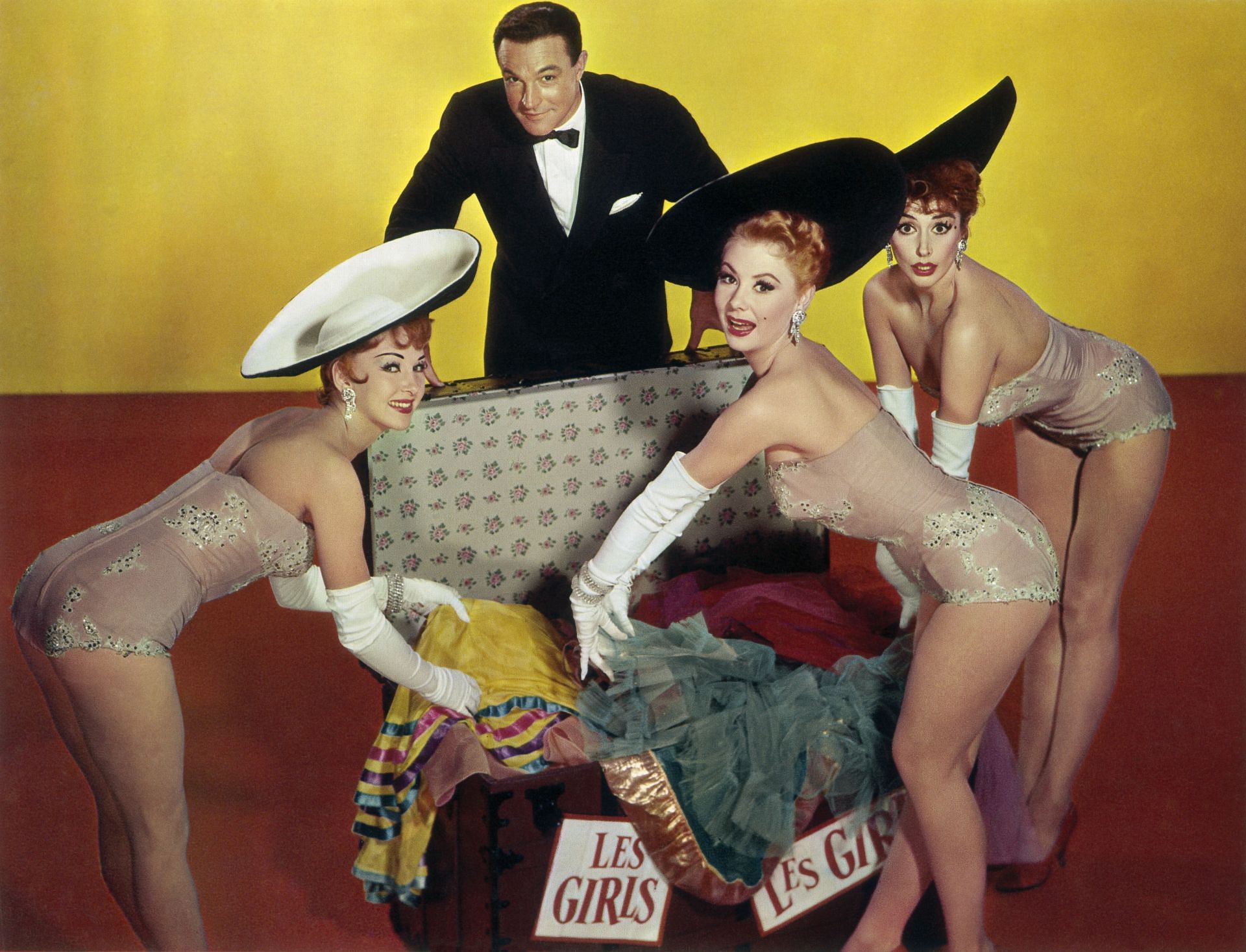Taina Elg (Left), Mitzi Gaynor, Kay Kendall, and Gene Kelly on the set of Les Girls. - (Image via Getty)